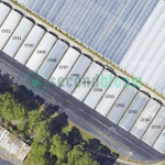Top-down sky view of X.S. Smith Criterion Quonset Greenhouses (Cold Frames) for sale at SecondBloom Auctions.